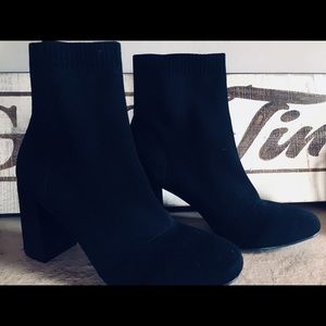 Black sock booties.